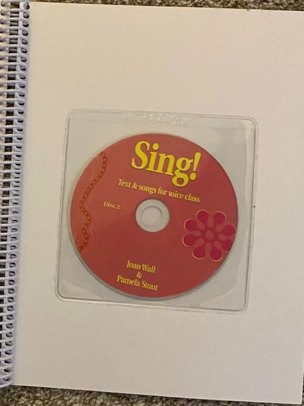 Sing! Text & Songs for Voice Class by Joan Wall & Pamela Stout with 2 CDs.
